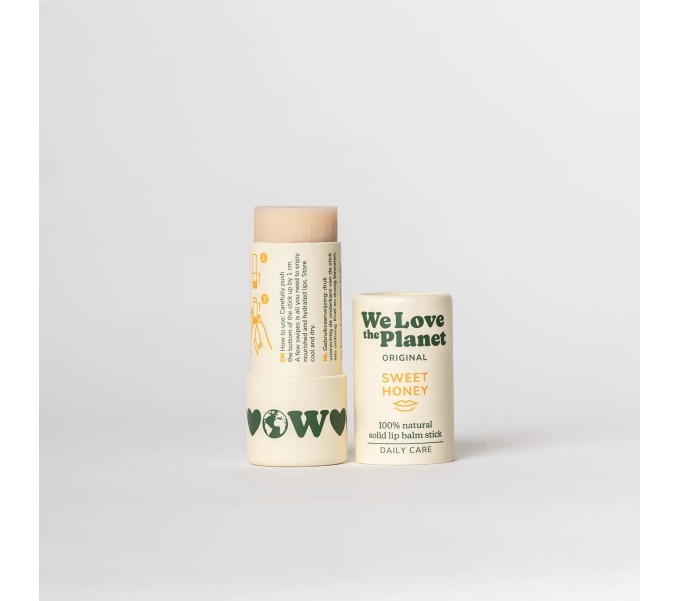 STICK LABIAL SWEET HONEY 4.9 G WE LOVE PLANET - Farmacia Coliseum